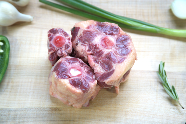A close up of some meat on a cutting board