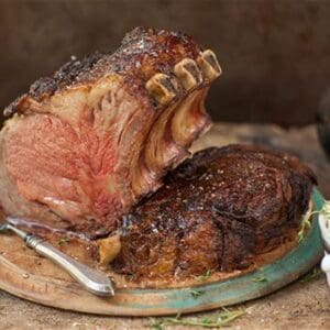 A large piece of meat on top of a plate.