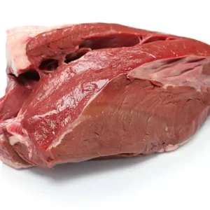 A piece of meat is sitting on the counter.