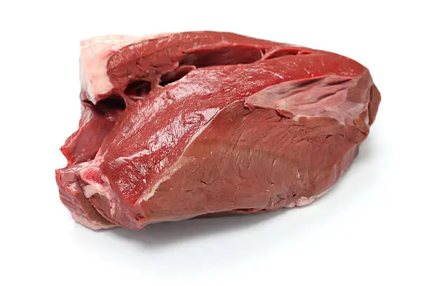 A piece of meat is sitting on the counter.