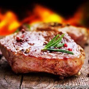 Grilled steak with herbs and spices.